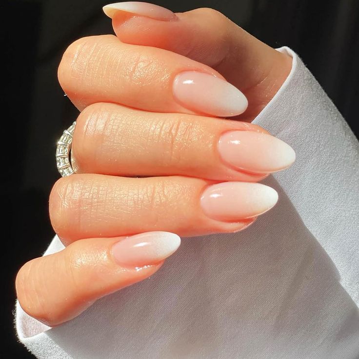 Elegant Ombre Almond-Shaped Nails: Soft Pink to White Gradient for Effortless Chicness.