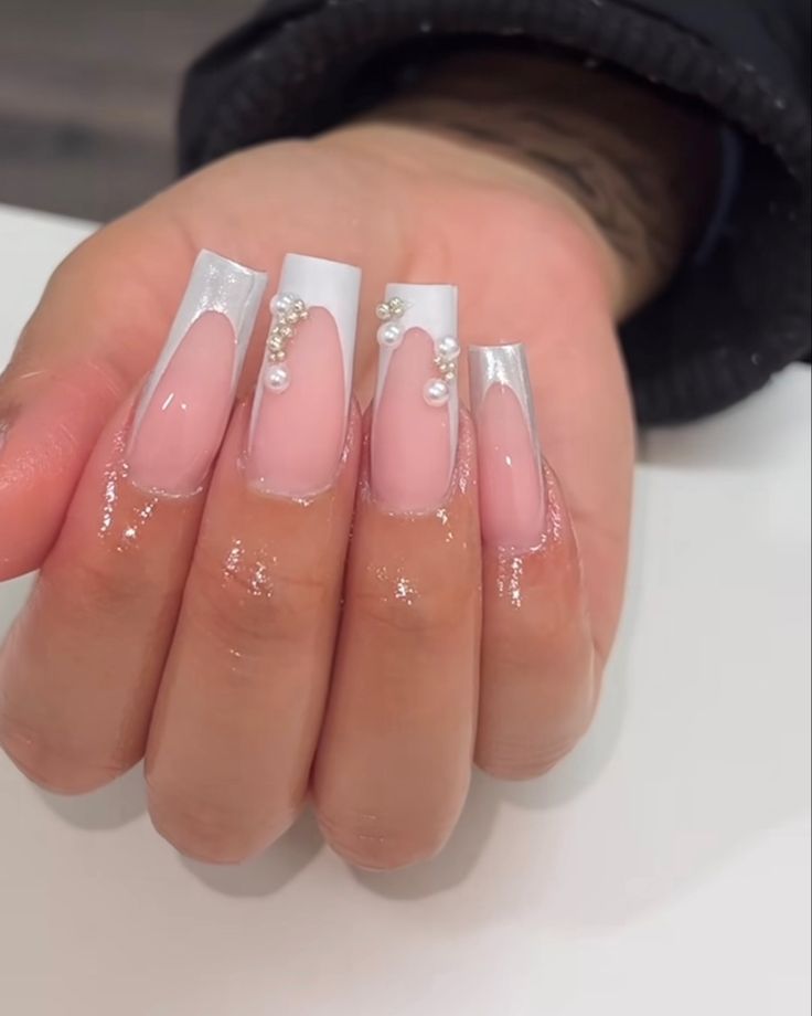 Sophisticated Soft Pink and White Nail Design with Negative Space and Pearls