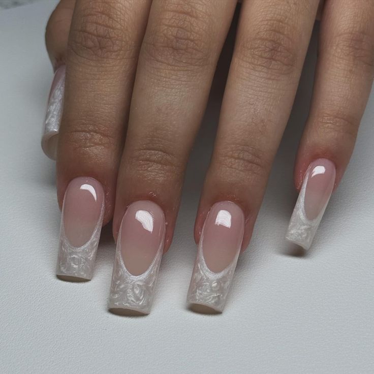 Sophisticated French Manicure: A Soft Gradient with Luxurious Textured Tips.