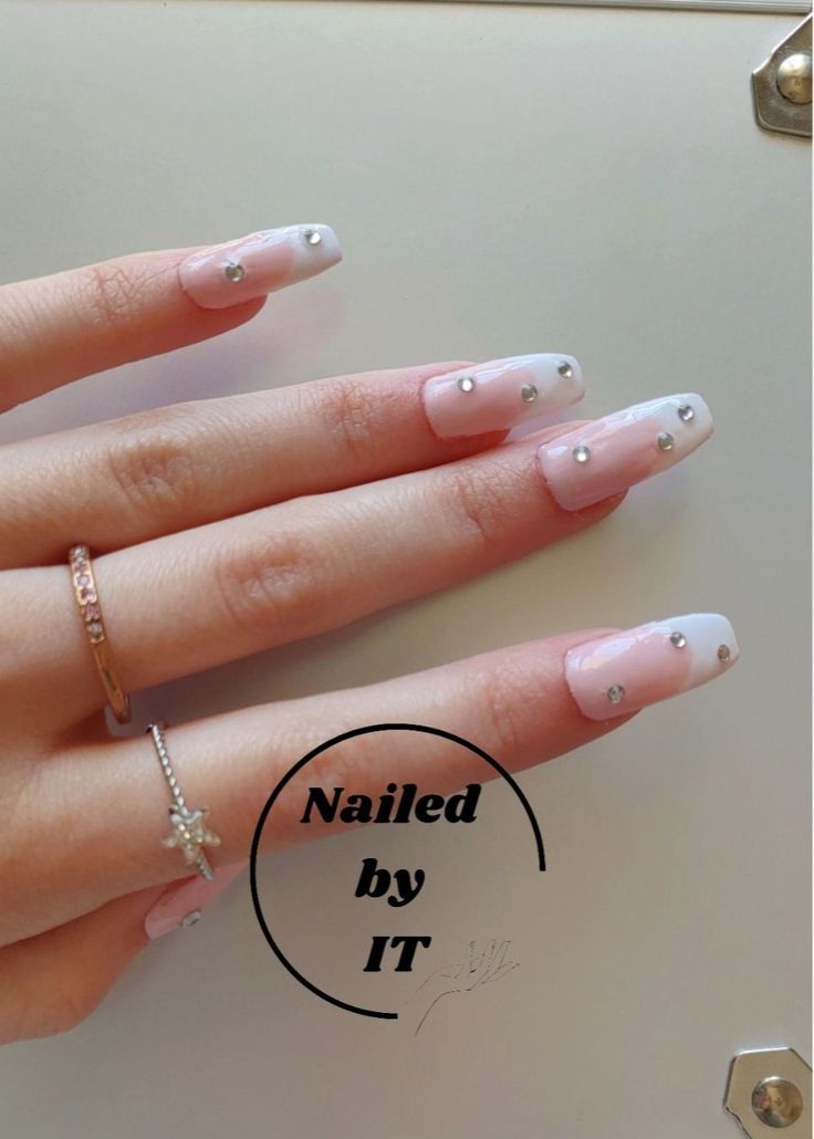 Sophisticated Ombre Nail Design with Glossy Tips and Rhinestone Accents