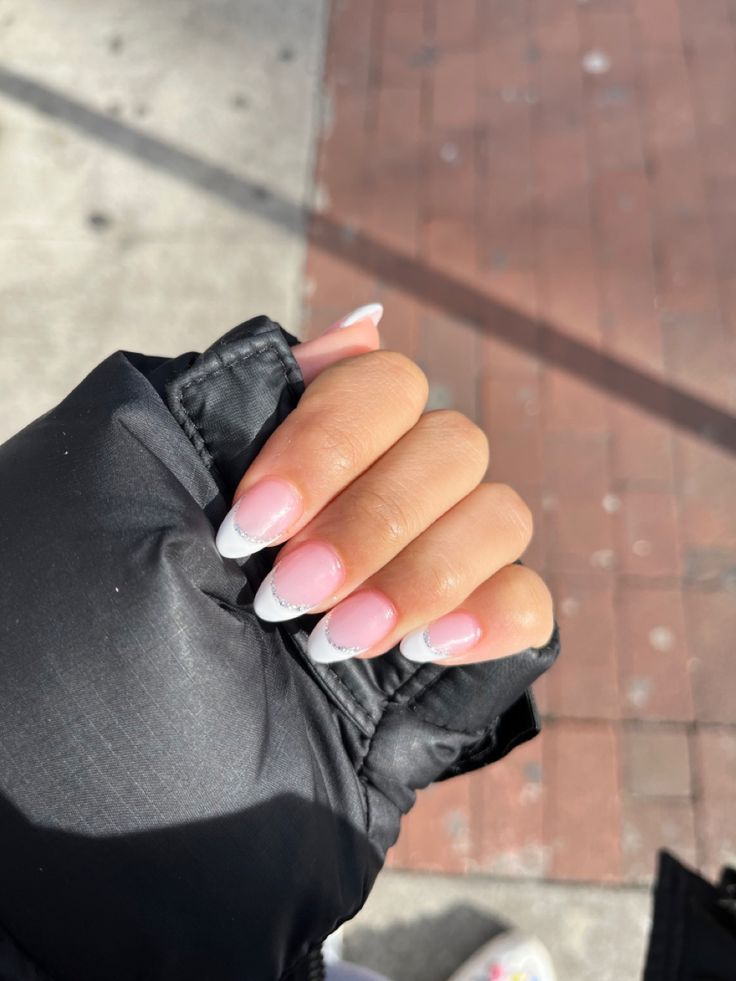 Elegant French Tip Nail Design: A Timeless Blend of Soft Pink and Crisp White.