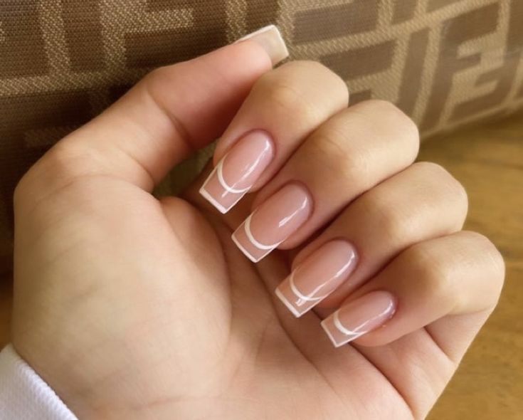 Elegant Chic: Modern French Manicure with Nude and White Tips