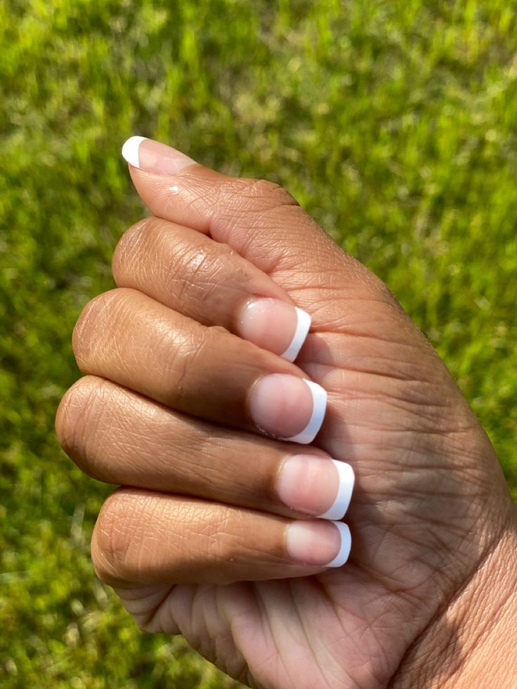 Timeless Elegant French Manicure: A Sophisticated Classic for Any Occasion.