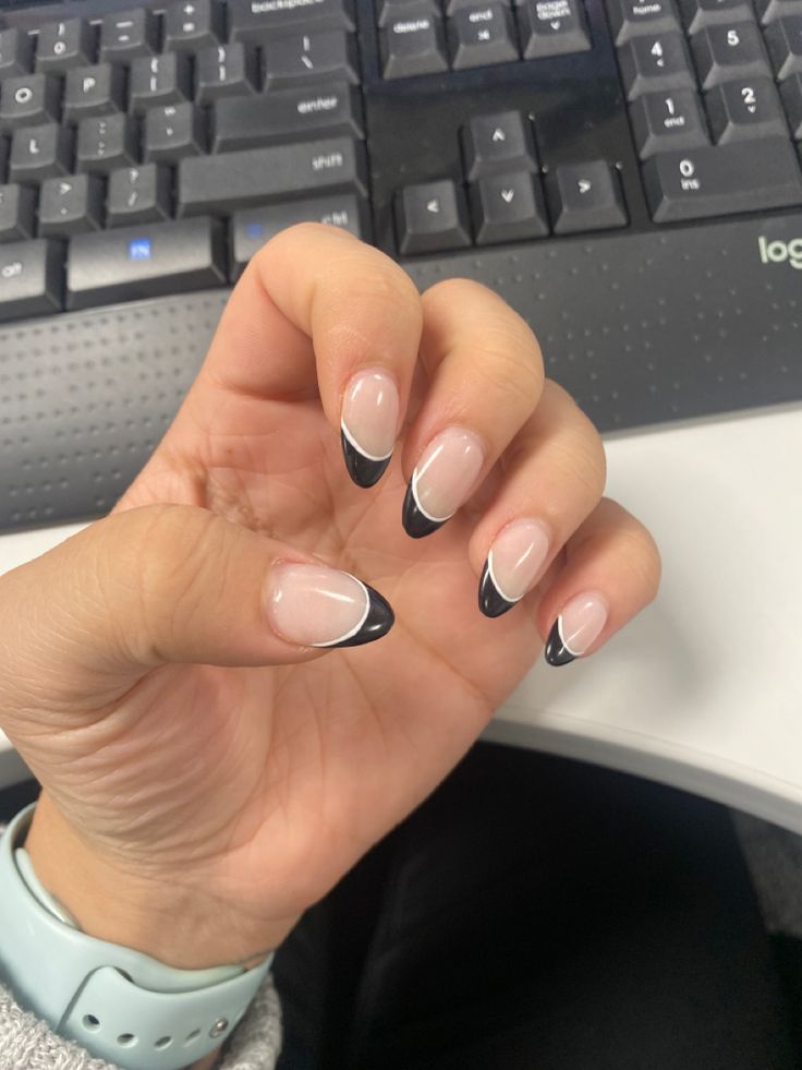 Chic and Versatile Black-Tipped French Nail Design on Nude Base