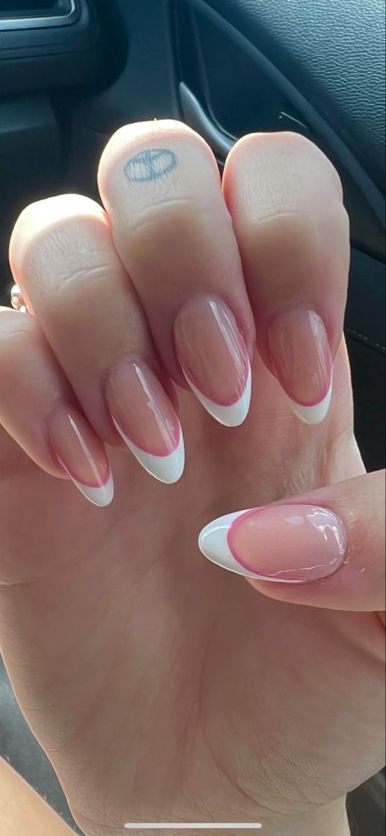 Chic French Manicure with a Modern Twist and Subtle Pink Line Detail.