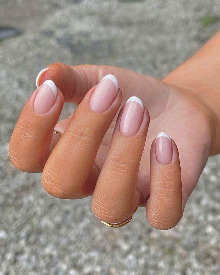 Chic Classic French Tip Nude Manicure: Timeless Elegance Redefined.