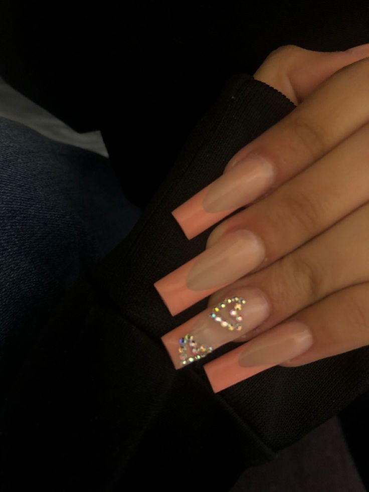 Chic Nude Acrylic Nails with Glamorous Sparkling Accents