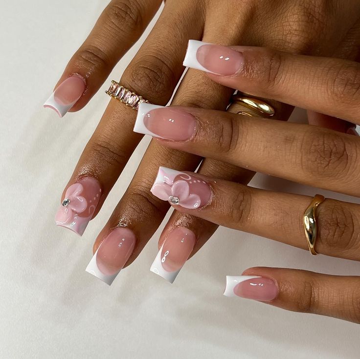 Chic Elegant Floral Nail Design with Soft Pinks and Sparkling Gems