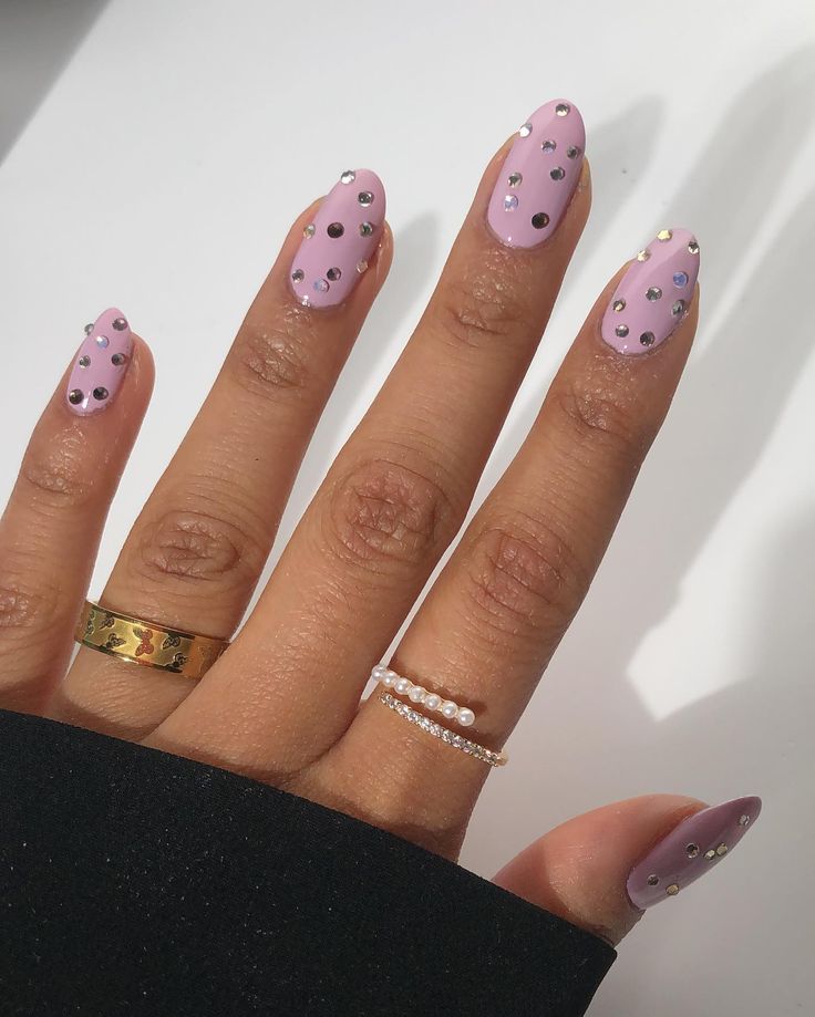 Elegant Pastel Lavender Manicure with Rhinestones and Complementary Rings