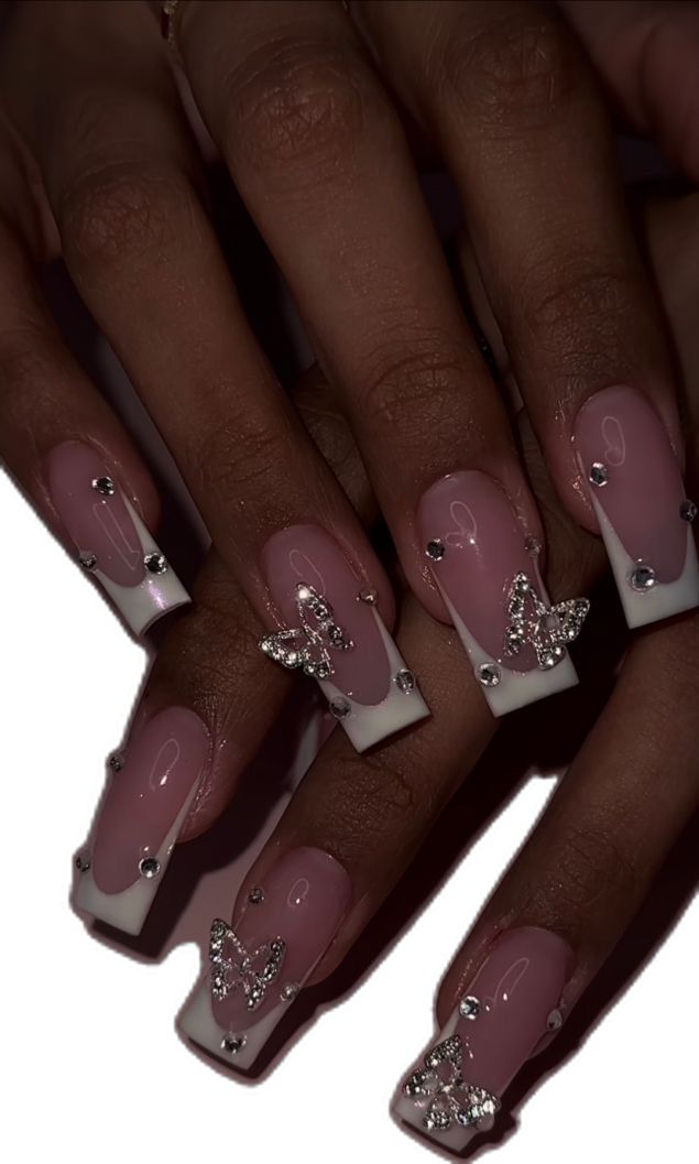 Chic French Manicure: Soft Pink Base with White Tips, Rhinestones, and Butterfly Accents