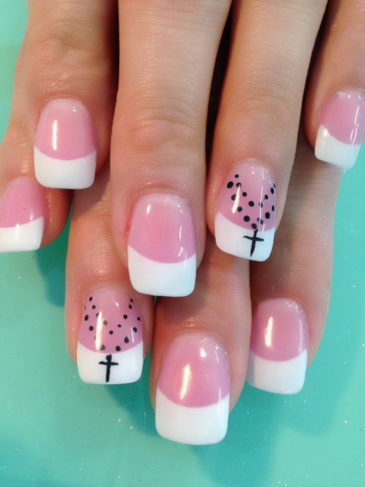 Sophisticated Soft Pink and White Manicure with Unique Black Accent Designs.