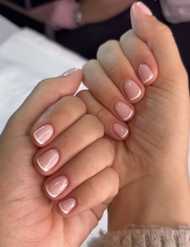 Timeless Elegance: Soft Nude Nail Design with Delicate White Tips