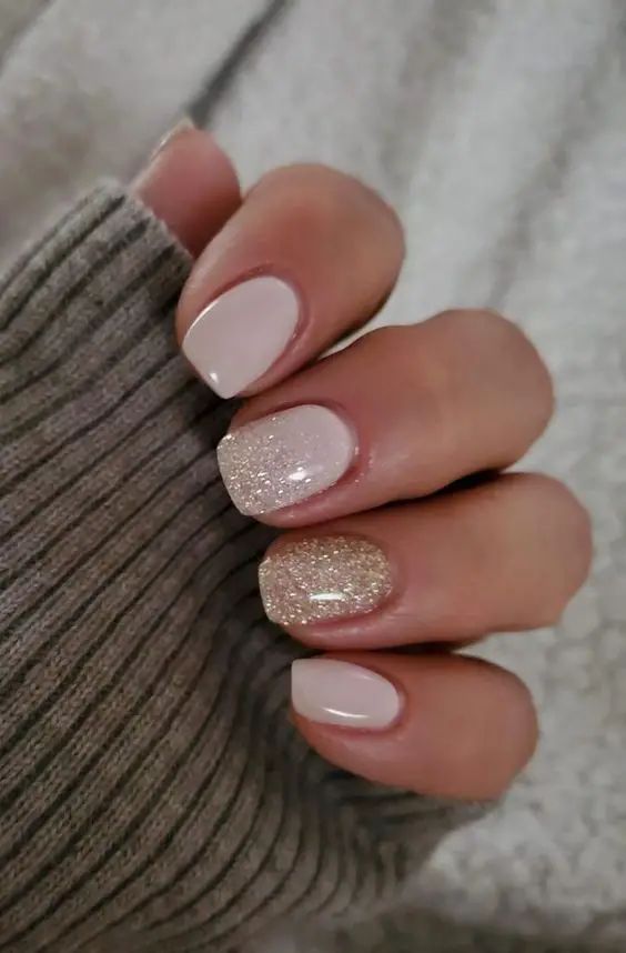 Chic Nude and Gold Nail Design for Any Occasion.