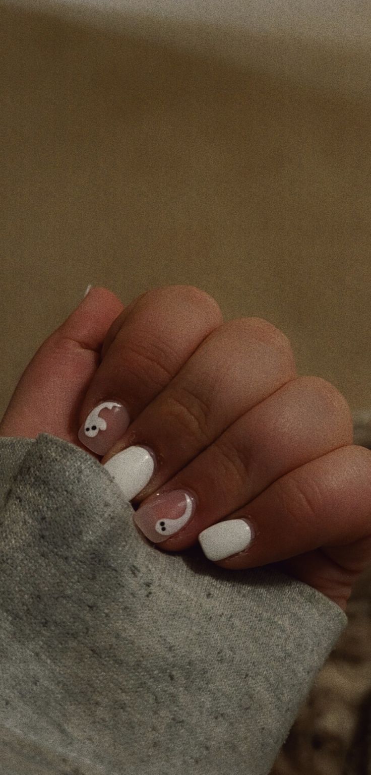 Whimsical Ghost Motif Nail Design Adds Creative Flair to Casual Looks