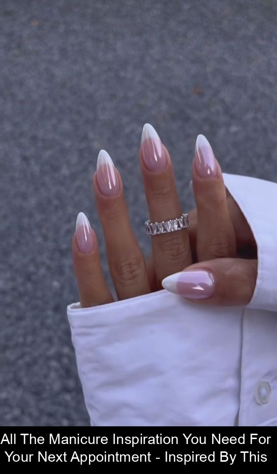 Sophisticated Ombre Almond-Shaped Nails with Chic Silver Ring Accents.