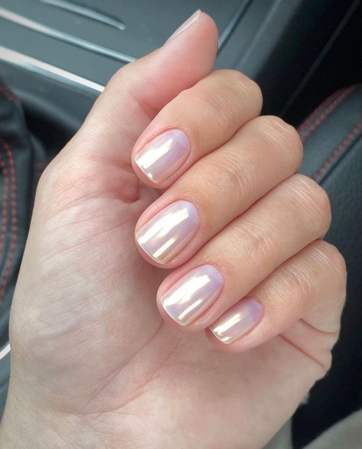 Elegant Soft Pearl Nail Design with Subtle Pink and Gold Accents