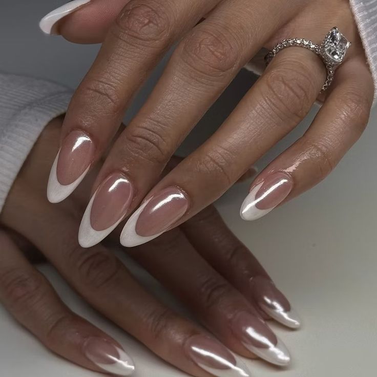 Sophisticated Almond-Shaped Nails with Classic French Tips and Subtle Shine