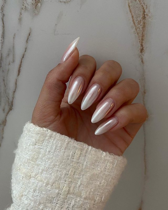 Sophisticated Almond-Shaped Nails with Pearlescent Finish for Any Occasion