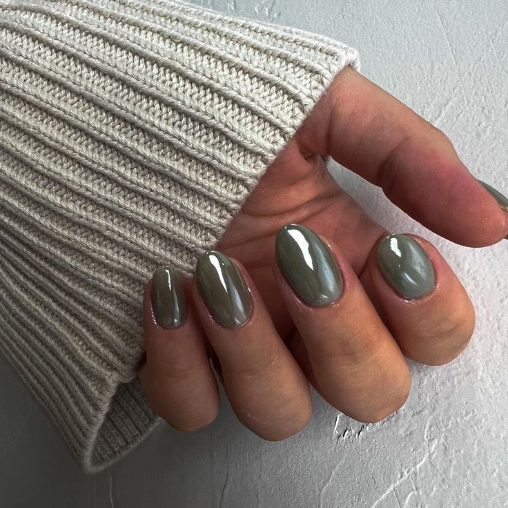 Chic Olive Green Almond Nails: A Sophisticated Touch to Cozy Style.