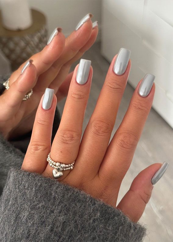 Modern Chic Gray Nail Design with Glossy Finish and Silver Accents