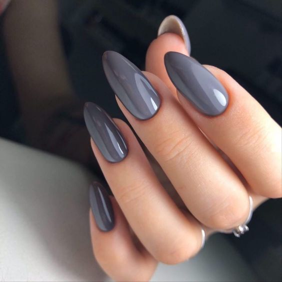 Sophisticated Deep Charcoal Gray Almond-Shaped Nails: A Chic Statement for Any Occasion.