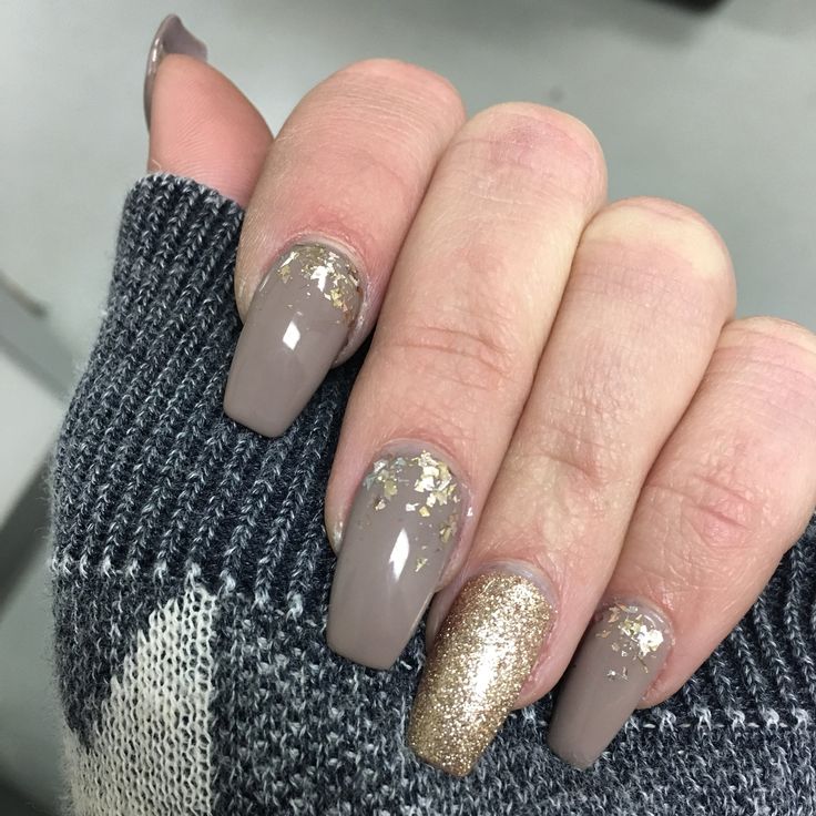 Chic Taupe Nail Design with Gold Accents and Glitter