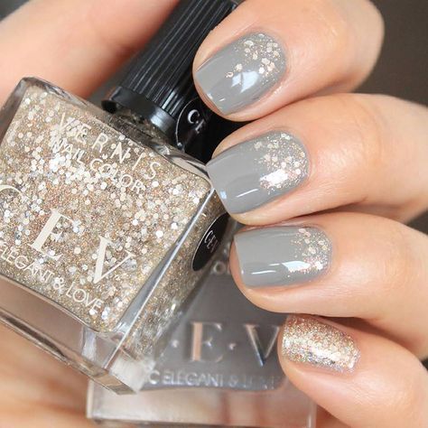 Elegant Grey Nail Design with Sparkling Gold Accents