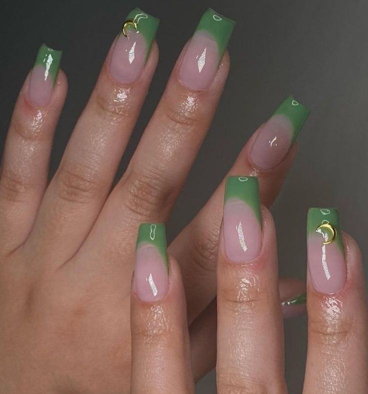 Elegant Green Ombre Nail Design with Crescent Moon Accents