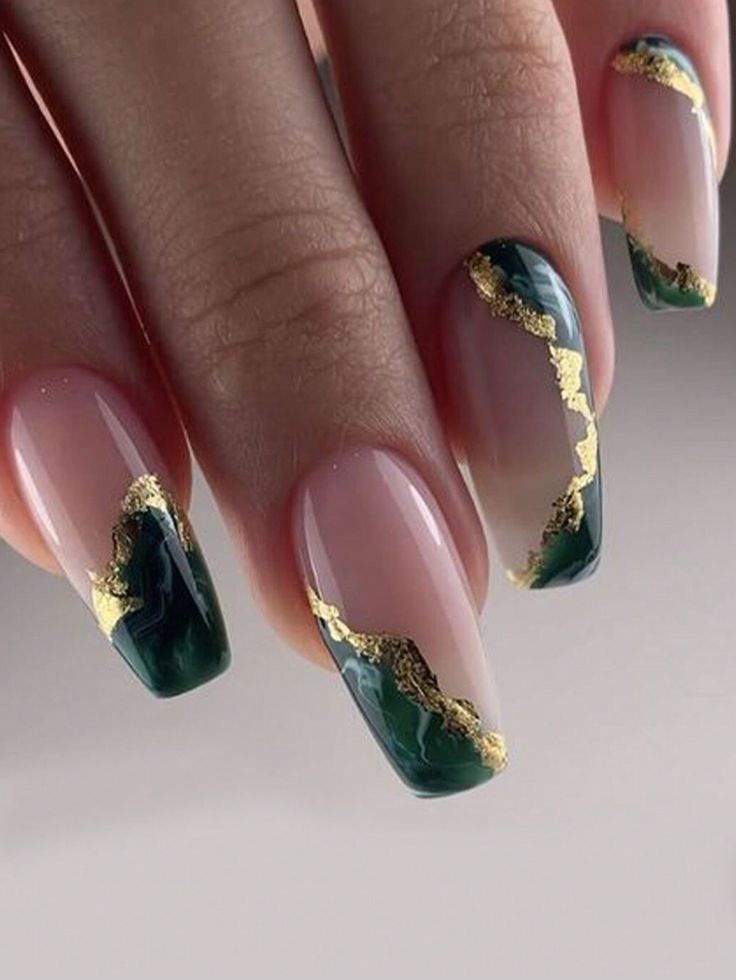 Sophisticated Nail Design: Deep Green and Nude Gradient with Elegant Gold Accents