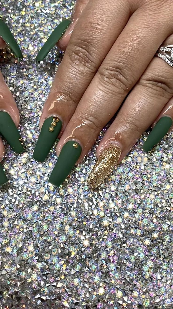 Elegant Matte Green Nails with Gold Accents for Glamorous Occasions