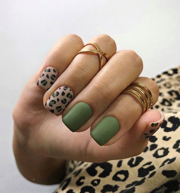 Chic Matte Olive Green Nail Design with Playful Leopard Print Accents