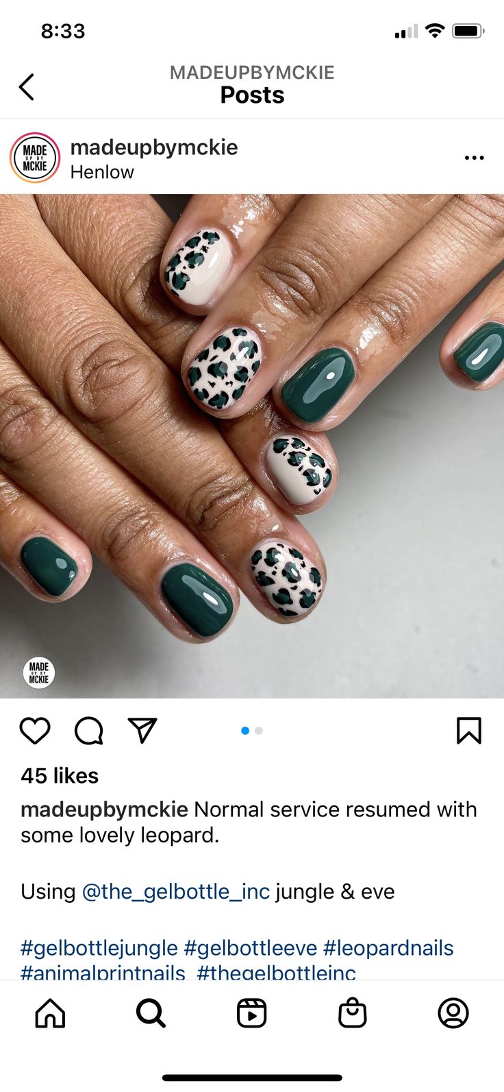 Chic Nail Design: Bold Deep Green Meets Playful Leopard Print with Elegant Neutrals.