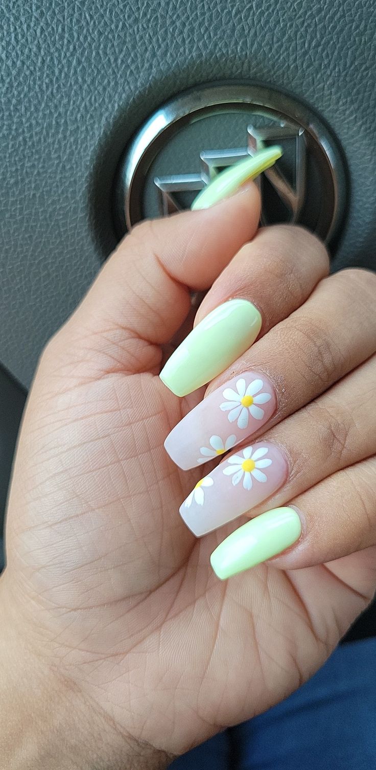 Cheerful Spring-Inspired Bright Pastel Nail Design with Mint Green, Pale Pink, and Delicate Daisies.