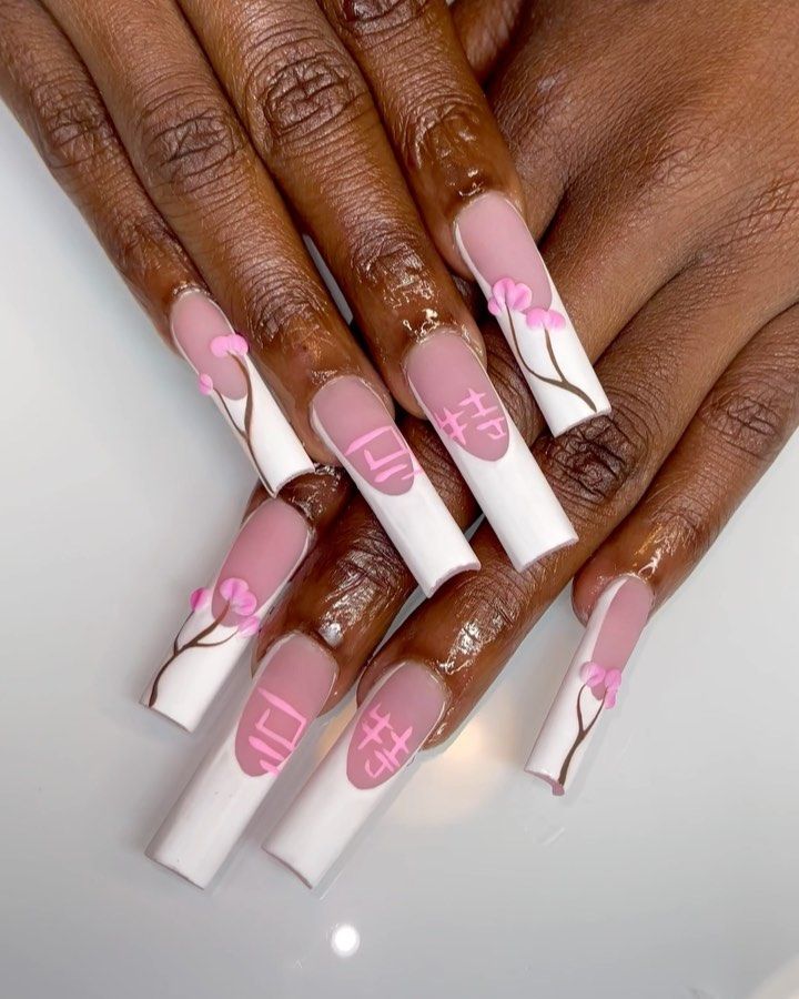 Sophisticated Gradient Nail Design with Cherry Blossom Motifs