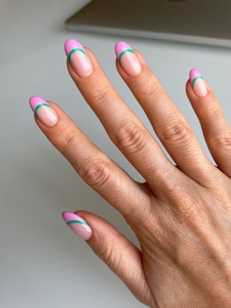 Chic French Manicure: Soft Pink Tips with Vibrant Green Accents