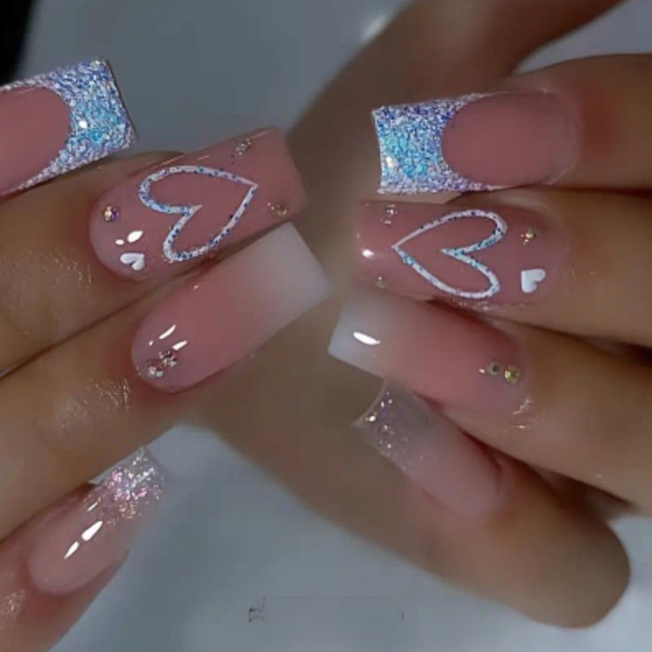 Romantic Soft Pink Nail Design with Heart Motifs and Shimmering Accents