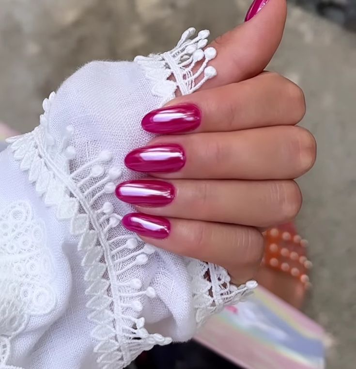 Elegant Deep Magenta Nail Design with Glossy Finish and Stylish Lace Accents.