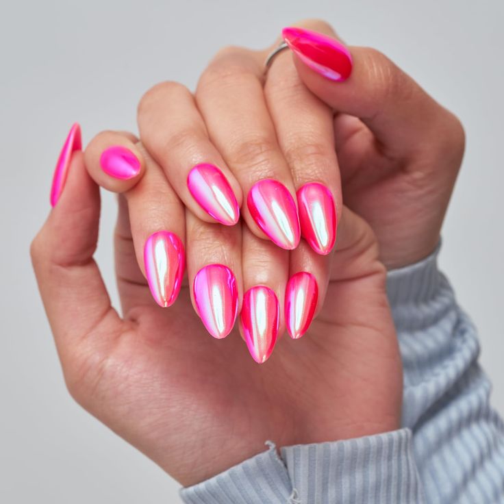 Stylish Vibrant Pink Glossy Nails with Iridescent Accents