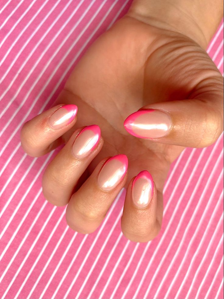 Chic Almond-Shaped Nails: Glossy Base with Vibrant Pink Tips for Sophisticated Elegance.