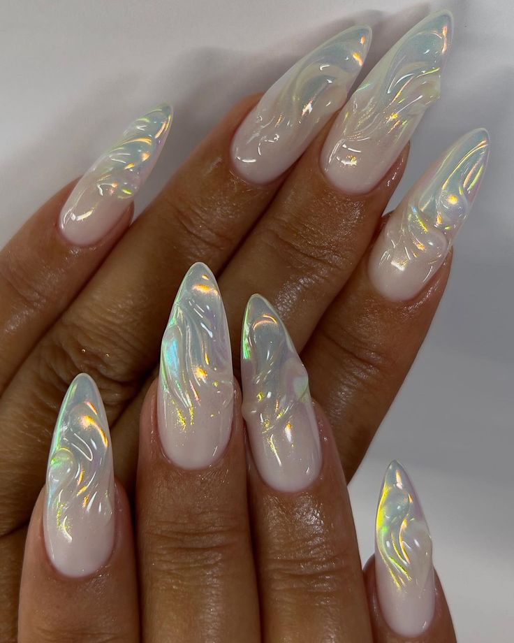 Iridescent Almond-Shaped Nails with Swirling Ethereal Patterns for a Modern Chic Look.