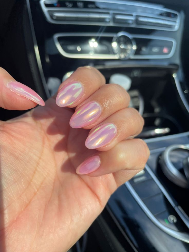 Elegant Holographic Pink Almond-Shaped Nails for Sophisticated Style.