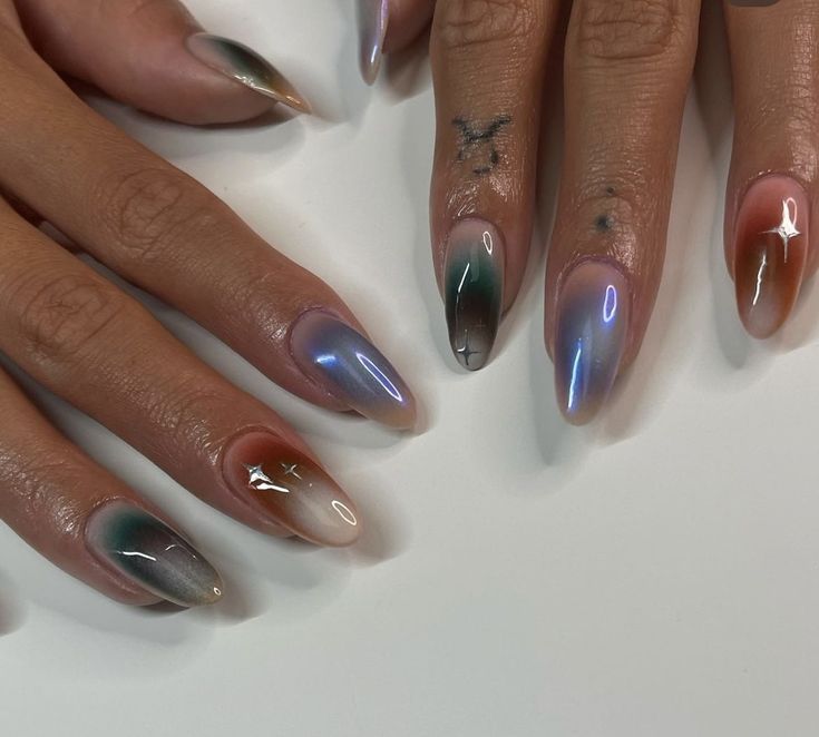 Elegant Gradient Nail Design: A Captivating Blend of Earthy Tones and Soft Pastels.