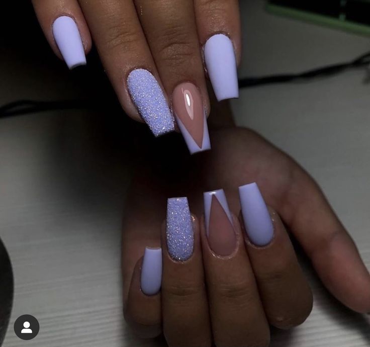 Elegant Lavender Nail Design with Matte, Textured Finishes and Modern Negative Space Accents.