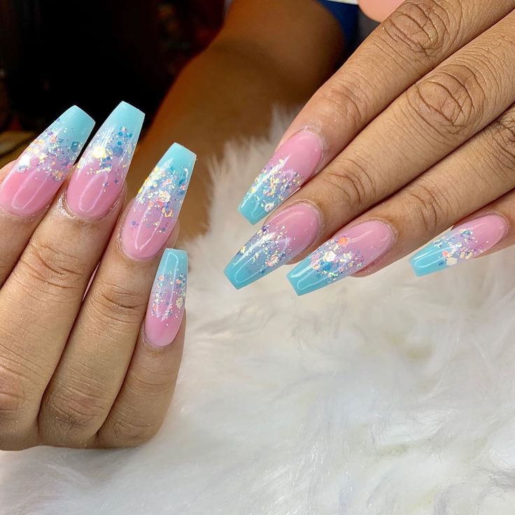 Playful Pastel Stiletto Acrylic Nails with Glossy Finish and Glitter Accents