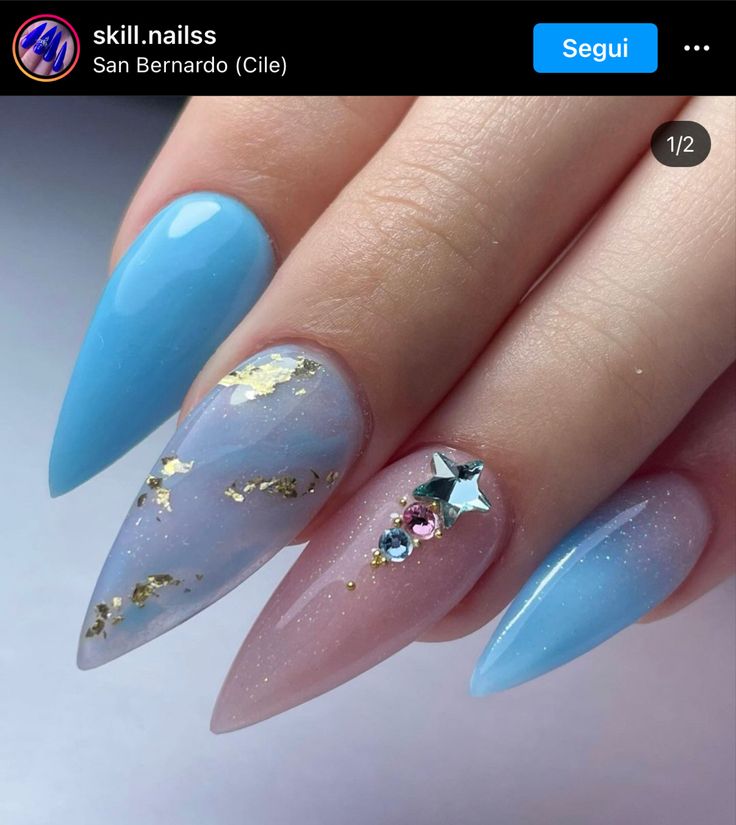 Elegant Almond-Shaped Nails: Sophisticated Blue Gradient with Gold Leaf and Glitter Accents.