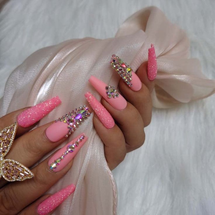 Glamorous Elegant Pink Nail Design with Matte, Glitter, and Rhinestone Accents.