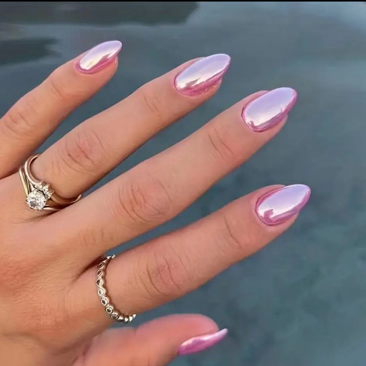 Chic Metallic Pink Almond Nails: A Modern Elegance for Any Occasion.