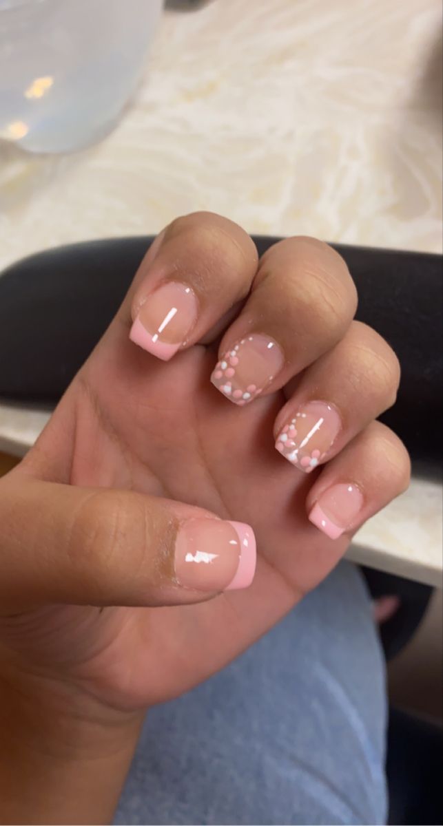 Elegant Delicate Pink Nail Design with Soft French Tips and Polka Dot Accents