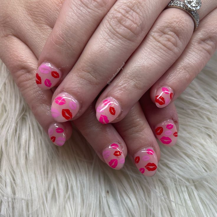 Playful Pink and Red Kiss Print Nail Design for a Fun, Flirty Aesthetic.