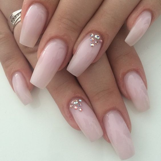 Sophisticated Elegant Nude Pink Acrylic Nail Design with Rhinestone Accents.